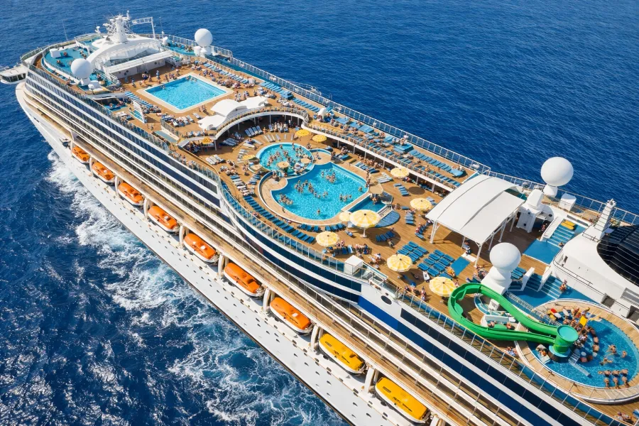 Cruise ship deck with pools and sun loungers
